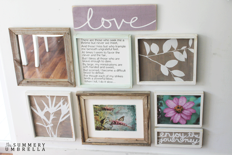 A gallery wall with the DIY love wood sign