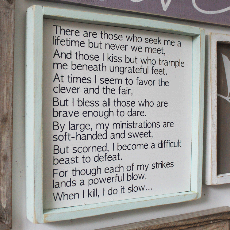 A quote from a book framed in a wood frame